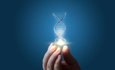 dna in hand on blue background