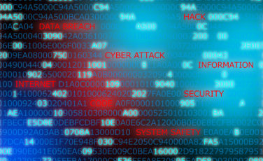 Words technology security code computer attack highlighted in against computer code background