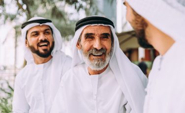 three business men in Dubai in traditional emirati clothing